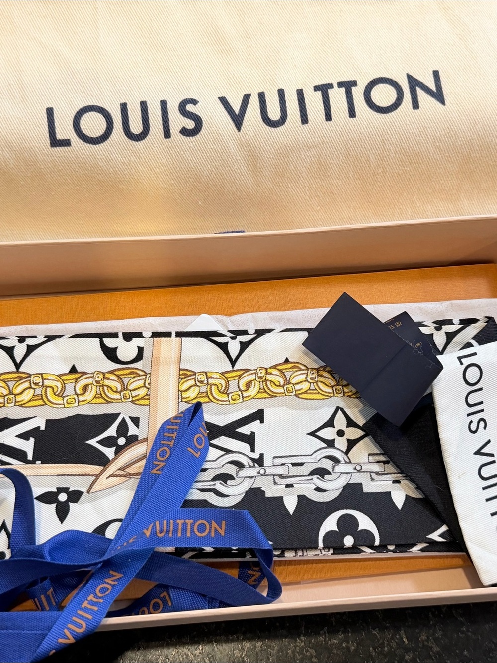 Louis Vuitton Black, White & Gold Chain Monogram Silk Scarf with Blue Ribbon